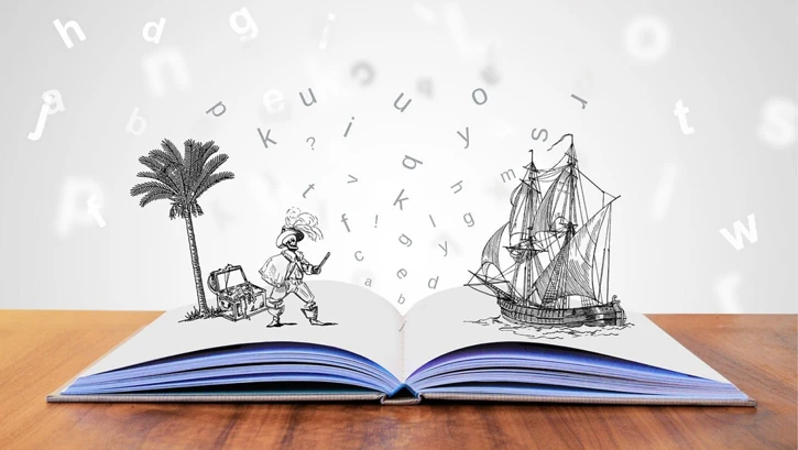 Ein aufgeschlagenes Buch mit der Skizze eines Pirats und eines Piratenschiffs